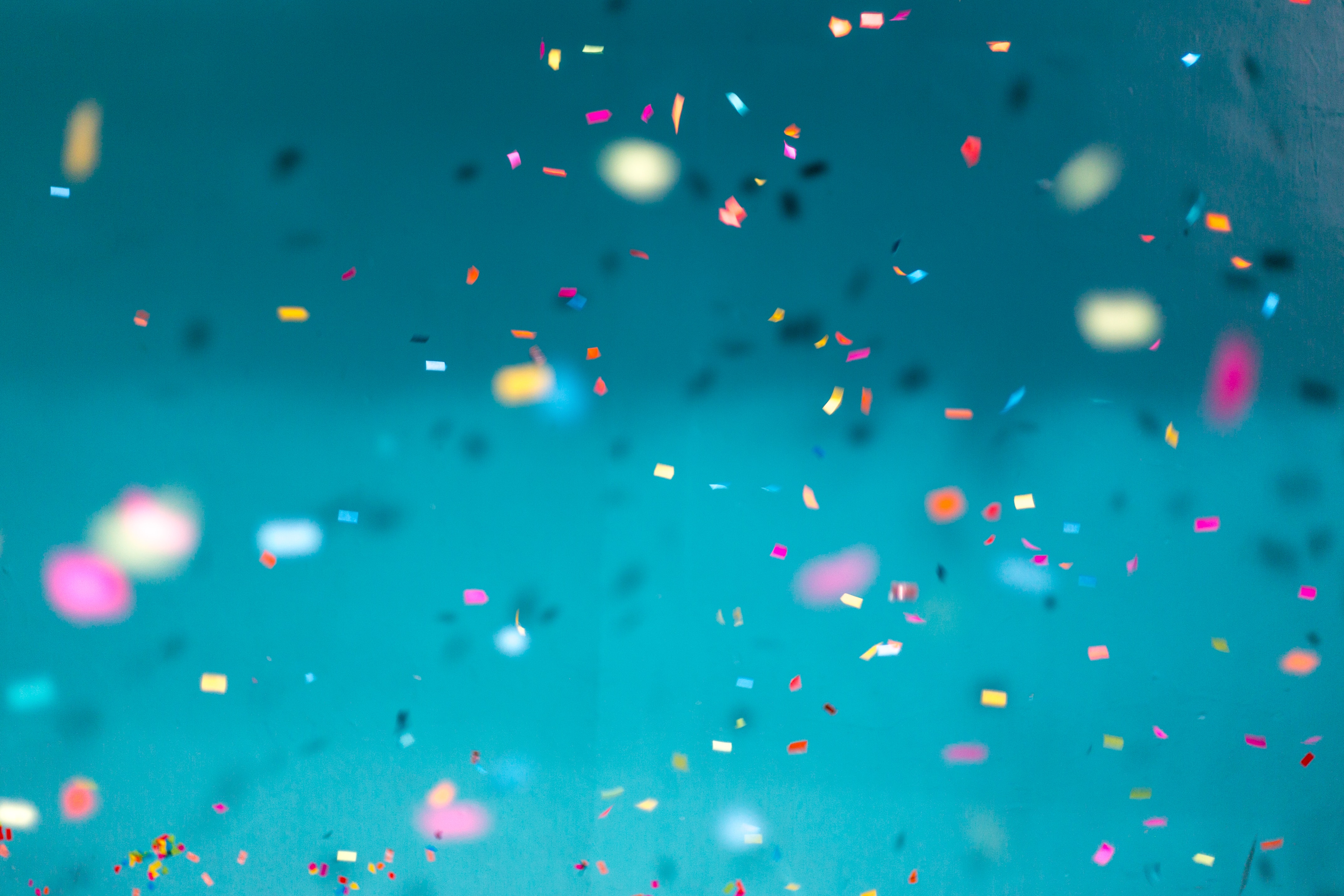  different colored confetti falling down