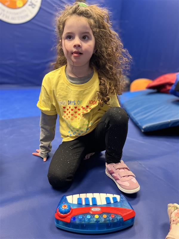 Isabella is working on her piano skills!